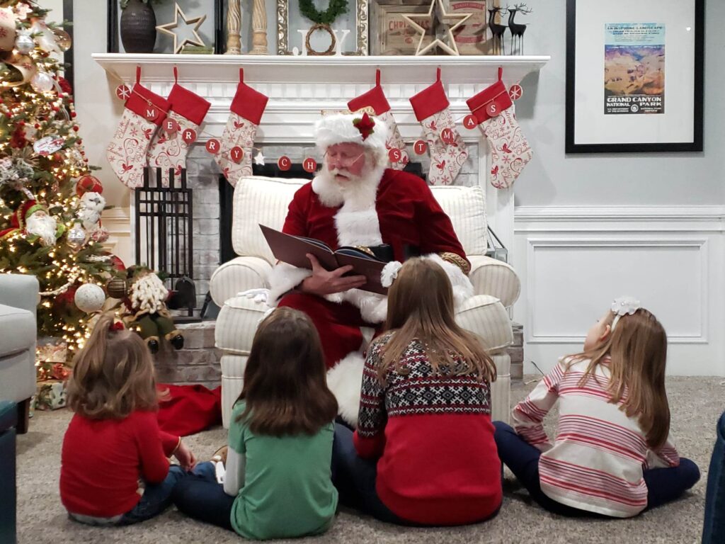 Santa John reads one of his North Pole Stories